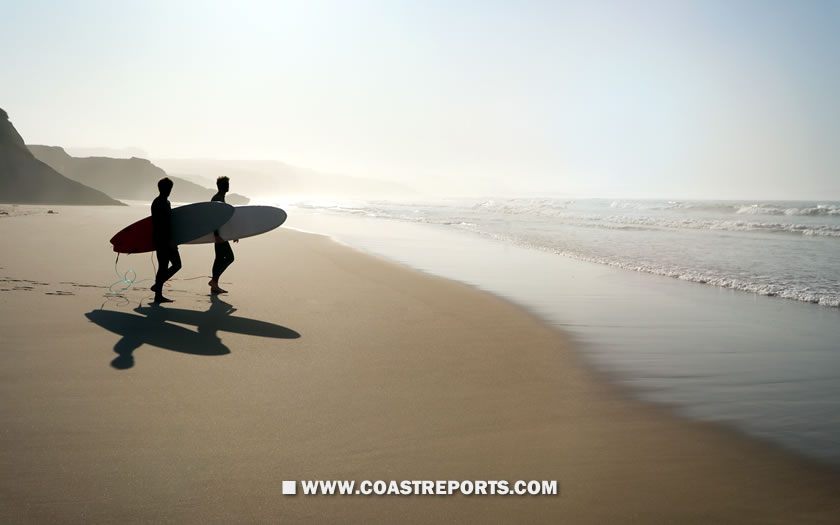 Surfers at Lagide beach near Peniche